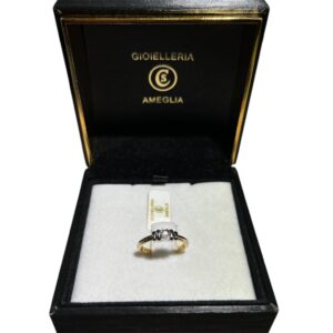 Anello oro bianco e giallo e diamante centrale