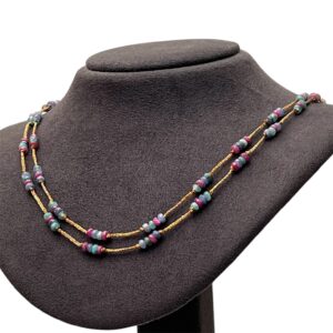 Collana in oro con zaffiri rubini smeraldi