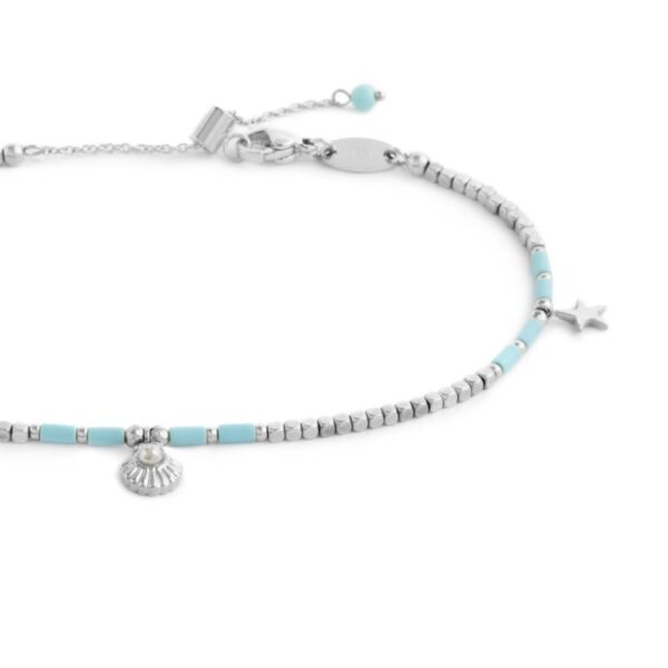 Cavigliera con ematite cubica alternata a perline conchiglia e stelle marine pendenti - immagine 2